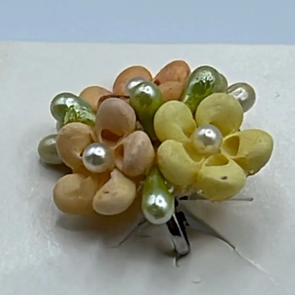 Vintage pastel shell handmade flowers with screw backs earrings.